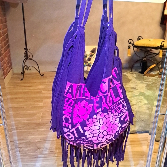 American Eagle Outfitters Handbags - American Eagle Outfitters Purple Hobo Bag with Fringe